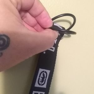 Ecko unltd cloth Belt with D ring closure. 50" long by 1.5" wide.